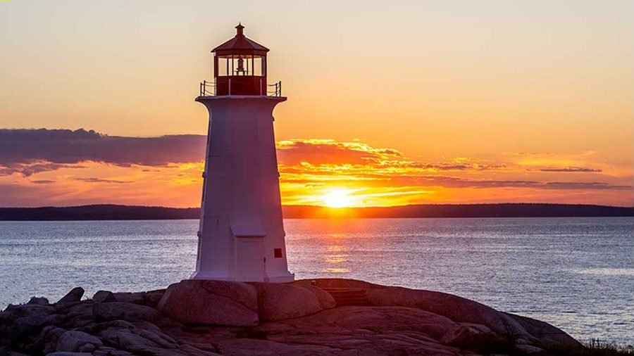 Peggy's Cove lighthouse at sunset